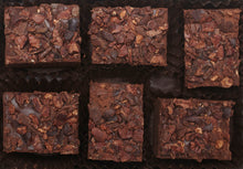 Load image into Gallery viewer, View from above of the opened “Crushed Cacao Nib” with six rectangle-shaped chocolate truffles arranged in two rows, 3 truffles per row, each in paper candy cup.