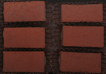Load image into Gallery viewer, View from above of the opened “Mocha Cinnamon” with six rectangle-shaped chocolate truffles arranged in two rows, 3 truffles per row, each in paper candy cup.
