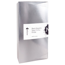 Load image into Gallery viewer, 2 dimensional silver rectangle angle of closed 8oz box with title of “Black Sesame Seed Toffee Brittle” and a black NeoCocoa logo.
