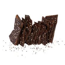 Load image into Gallery viewer, Close up of several pieces of sesame brittle candy stacked.