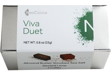 Load image into Gallery viewer, 2 dimensional rectangle silver box with a label wrapped around the box stating, “Viva Duet” with NeoCocoa logo and net weight  0.8 oz (23g). Can see a little of the side of the label with image of one almond butter smoked sea salt truffle and one zester lime truffle.