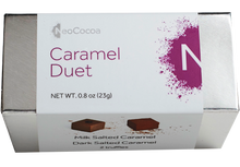 Load image into Gallery viewer, 2 dimensional rectangle box with a label wrapped around the box stating, “Caramel Duet” with NeoCocoa logo. Can see some of the side of the label with image of a dark salted caramel truffle and a milk salted caramel truffle.  