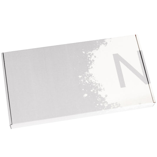 Closed silver colored rectangle brittle gift box showing NeoCocoa logo on lid in white.